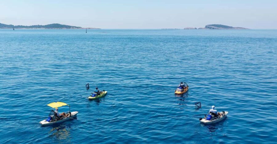 Cavtat: Fishing Duo at Sunrise or Sunset